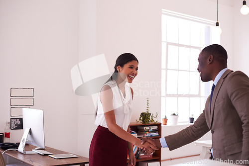 Image of Happy woman, business people and handshake for partnership, trust and thank you with mockup. Employees shaking hands for success, collaboration and support of b2b networking, welcome and hiring deal