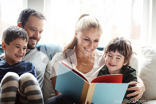 Image of Family, reading book together with parents and children, happiness at home with story time and learning. Love, relationship and happy people bonding in living room, education and mom, dad with kids