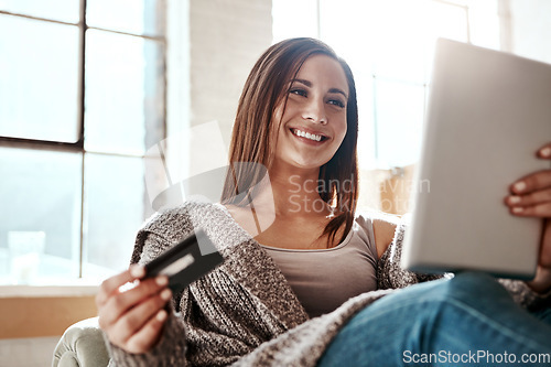 Image of Online shopping, mobile app and credit card, happy woman on couch with tablet and internet banking in home. Ecommerce technology, cashback payment and girl on sofa on retail website or digital shop.