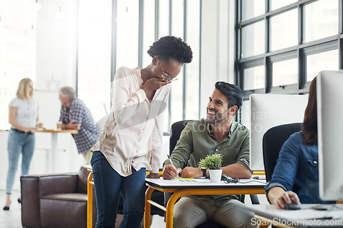 Image of Laughing, man and woman in coworking space with joke, smile and happiness at creative start up agency. Computer, desk and happy team leader in funny conversation with designer in office with comedy.