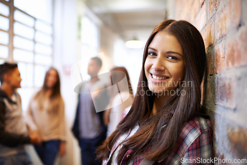 Image of Education, happy and portrait of woman in college hallway for studying, learning and scholarship. Future, happy and knowledge with student leaning against wall for university, relax and campus