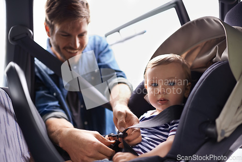 Image of Safety, car seat and belt with father with baby for transportation, security and drive. Travel, protection and caution with man fasten strap on toddler in vehicle for responsibility and road trip