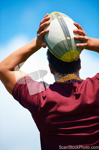 Image of Back, rugby and man with a ball, game and fitness with exercise, playing and workout. Professional player, guy and athlete with training, practice for a match and sports with confidence and wellness