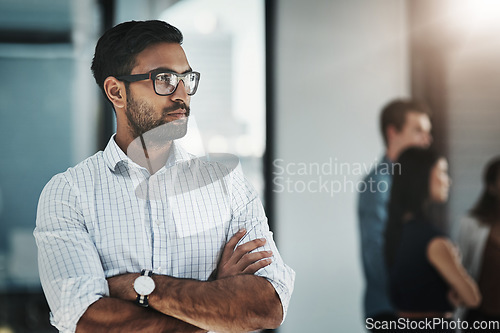 Image of Businessman, arms crossed and office workplace, leadership or thinking, dreaming and planning startup, idea or focus on meeting. Man, confidence or person, small business development and vision