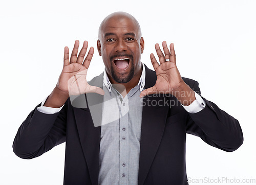 Image of Portrait, announcement and a business black man shouting in studio isolated on a white background corporate work. Voice, excited and surprise with a senior male speaker giving a speech for motivation