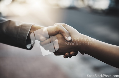 Image of Business people, handshake and meeting in city for b2b, partnership or introduction and greeting outdoors. Hand of employees shaking hands for team collaboration, agreement or deal for hiring in town