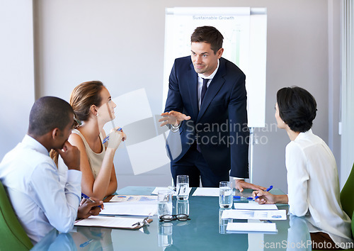 Image of Business man, speaker and meeting of a corporate management team with sales talk. Speaking, businessman and agency collaboration of company staff working in a conference room with vision strategy