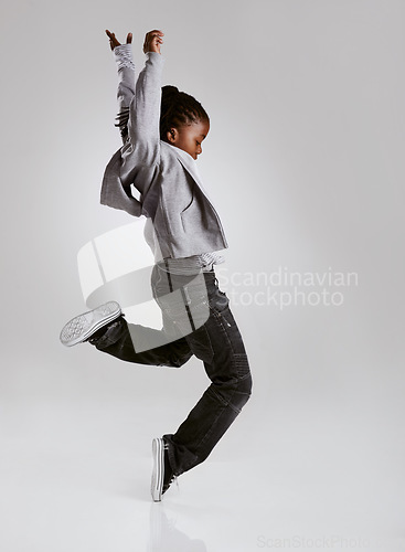 Image of Talent, hip hop and young boy dancer dancing isolated in a white studio background in a pose feeling excited. African, urban and kid or child with energy and skill ready for breakdance performance