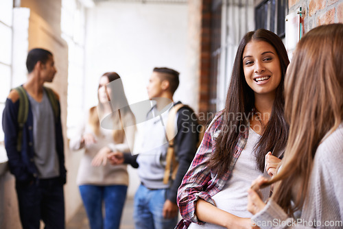 Image of Girl friends, university and hallway people talking with happiness, bonding or discussion together. Teenager, college or school communication of young gen z students on campus for education and class