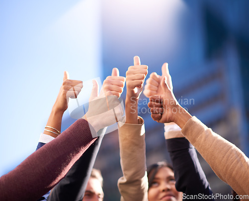 Image of Thumbs up, group or people in agreement with hands on blue sky outdoors. Teamwork, collaboration or community diversity and colleagues in support gesture outside in city background with flare mockup