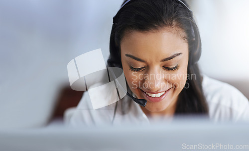 Image of Contact us, face or happy woman in call center consulting, speaking or talking at customer services. Virtual assistant, friendly or sales consultant in telemarketing or telecom company help desk