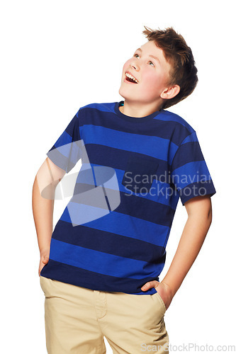 Image of Happy, young boy and wow in studio for fashion, sale or deal while posing excited on white background. Surprised, preteen and male person looking up for discount, good news or isolated announcement