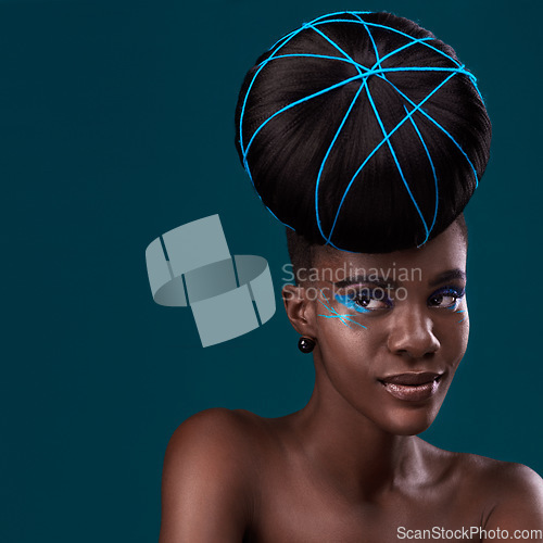 Image of Thinking, hair and mockup with a model black woman in studio on a blue background for beauty. Idea, space and cosmetics with an attractive young female person at the salon for fashion or makeup