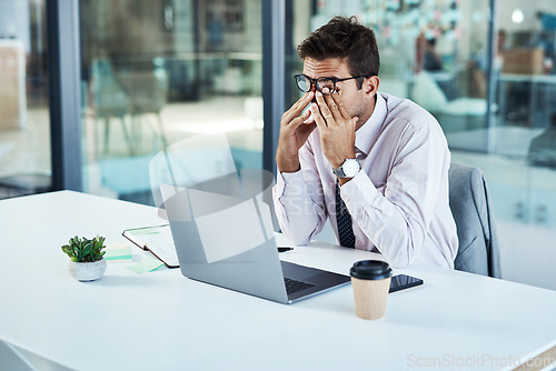 Image of Stress, laptop and man with headache in office frustrated with glitch, mistake or crisis. Anxiety, migraine and male business person angry with fail, 404 or bad review, deadline report or burnout