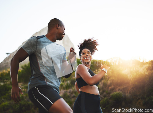 Image of Fitness, energy and athletes running in nature by a mountain training for race, marathon or competition. Sports, health and African couple doing outdoor cardio workout or exercise together at sunset.