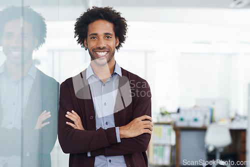 Image of Workplace, portrait or happy black man with arms crossed, pride or smile in a business or modern office. Headshot of proud African American worker smiling with confidence, mission or positive mindset