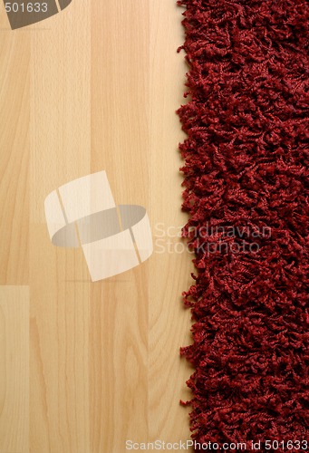 Image of Rug on laminate floor