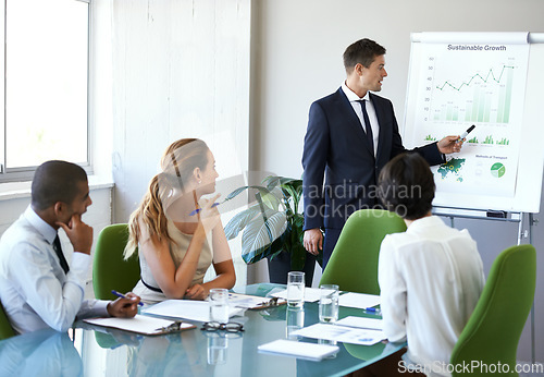 Image of Business man, speaker or presentation of corporate management team with sustainable growth chart. Training, people or collaboration of eco friendly company staff in conference room for report meeting