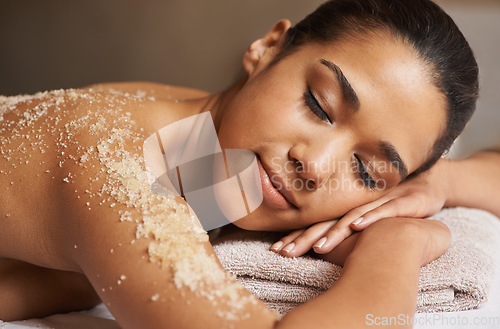 Image of Woman, body scrub or back massage in spa to relax for zen, sleeping or wellness physical therapy in resort. Relaxed girl client in salon to exfoliate for luxury skincare treatment or beauty therapy