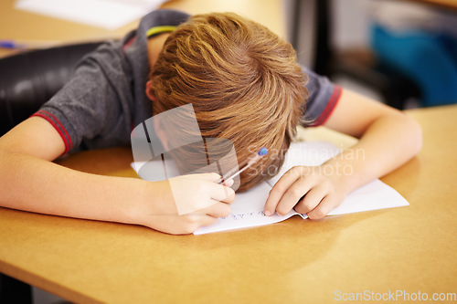 Image of Sleeping, bored and notebook with boy in classroom for learning, education and knowledge. Stress, anxiety and tired with male student with notebook at school for exhausted, dreaming and frustrated