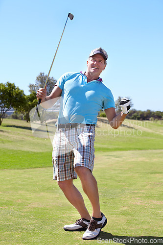 Image of Happy golfer man, fist celebration and game on grass with winning, goal or outdoor for sports, exercise or contest. Senior guy, winner and excited at golf course with sunshine, competition or workout