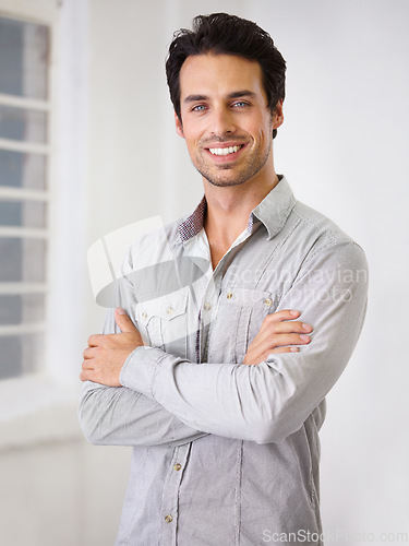 Image of Portrait, smile and man with his arms crossed, fashion and handsome with happiness, aesthetics or casual outfit. Face, male person or gentleman with joy, Canada and wellness with a positive attitude