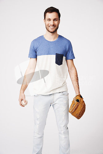 Image of Man, portrait and holding baseball with glove in studio for safety, pitch or catch in sport game by white background. Guy, isolated model and softball in sports gear, fitness and training with smile