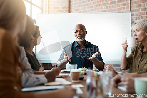 Image of Meeting leader, business people and black man in office, talking or speaking. Teamwork, ceo and senior African male mentor coaching, training or planning strategy with mockup in corporate workplace.