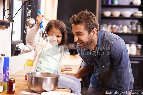 Image of Cooking, breakfast and father with daughter in kitchen for pancakes, bonding and learning. Food, morning and helping with man and young girl in family home for baking, support and teaching nutrition