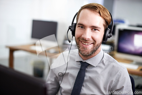Image of Portrait, call center and man with a smile, telemarketing and customer service with a headset. Face, male employee and happy consultant with headphones, tech support and communication with cm company