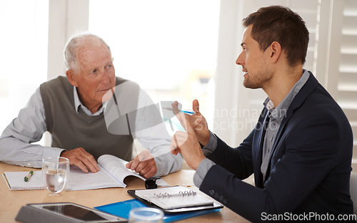 Image of Financial advisor talking to a senior man with an investment, savings or retirement planning. Discussion, documents and professional accountant helping an elderly male person with finance paperwork.