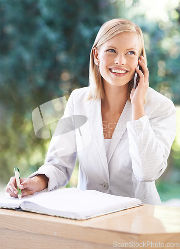 Image of Phone call, receptionist and woman taking notes at hotel, writing and thinking at reception. Smile, notebook and female secretary with cellphone for reservation, appointment and booking at spa.