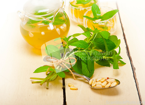 Image of Arab traditional mint and pine nuts tea