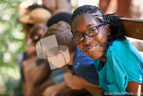 Image of Black girl, camp or friends portrait with happiness or glasses outdoor. Happy, African and female teen with face and a smile from summer camping, holiday or team building with fun people in treehouse