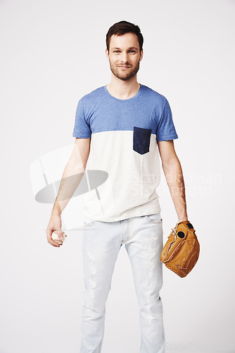 Image of Man, studio and holding baseball with glove for safety, pitch or catch in game, sport or contest by white background. Isolated athlete, softball and portrait in sports gear, fitness goal and training