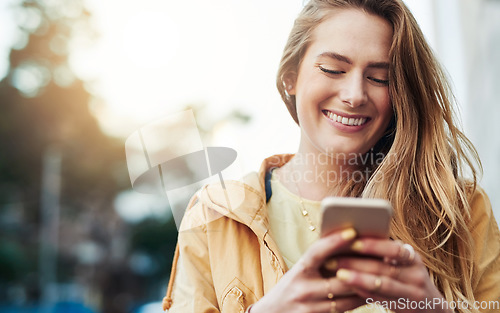 Image of Woman laugh at meme on smartphone, communication in city and chat on social media with connectivity outdoor. Happy young female person in urban street, text contact with mobile app and comedy online