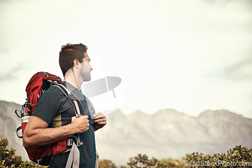 Image of Hiking, walking or man in nature on mountain for fitness, adventure or fun travel journey. Backpacker, view or workout exercise with male hiker trekking on path for training or freedom to explore