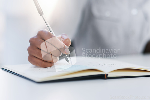 Image of Hand, pen and writing in notebook or planning, working and notes in journal, book or record for study or research. Person, write and closeup on work, communication or reminder and paper for school