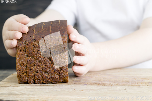 Image of chunks of dark bread