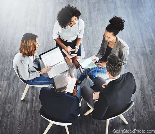 Image of Planning, meeting and business team in office brainstorming for a project with documents and technology. Collaboration, teamwork and group of corporate employees working with a tablet and paperwork.