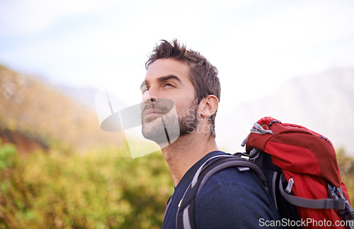 Image of Hiking, relax and thinking with man on mountain for fitness, adventure and travel journey. Backpack, summer and workout with male hiker trekking in nature path for training, freedom and explore