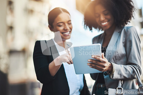 Image of Happy business people, tablet and smile in city for social media, communication or team collaboration. Woman, friends and smiling in teamwork working on technology for research or networking in town