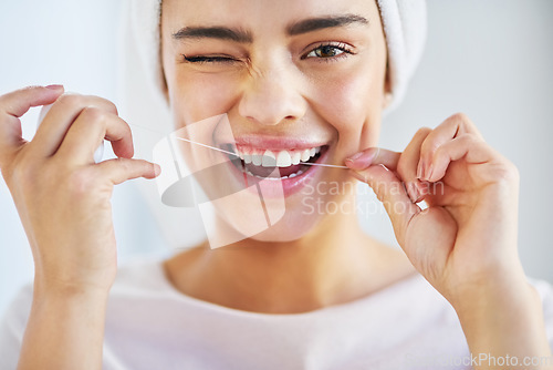 Image of Portrait, smile and woman with floss, dental and hygiene with wellness, happiness and fresh breath. Face, female person and girl with oral health, bathroom and cleaning with self care and cosmetics