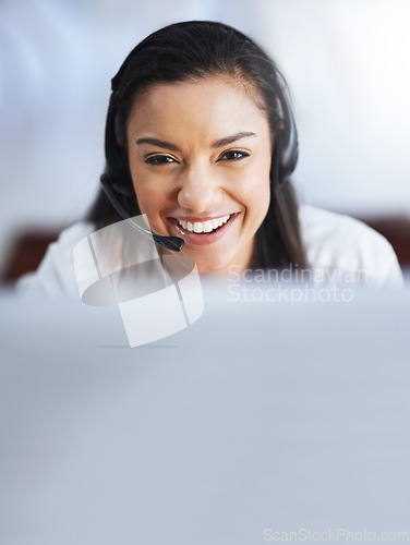 Image of Face, funny or happy woman in call center consulting, speaking or talking at customer services. Virtual assistant, friendly or sales consultant laughing in telemarketing or telecom company help desk