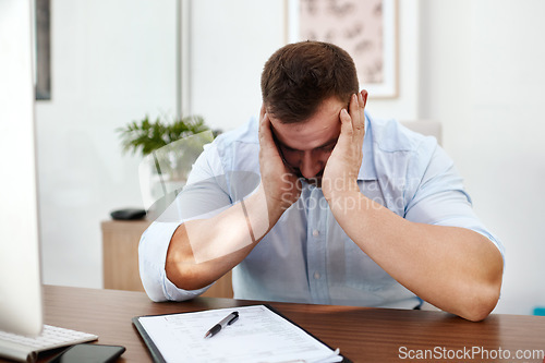 Image of Stress, headache and business man in office with documents for burnout, mental health risk or depression. Depressed, pain and tired person or employee with fatigue, brain fog or anxiety and paperwork