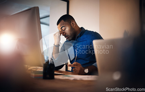 Image of Headache, eye strain and businessman in the office at night working on deadline project. Burnout, stress and professional male employee with migraine doing research on computer overtime in workplace.