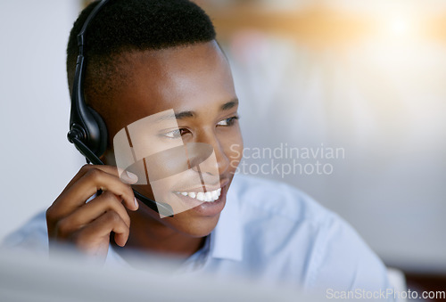 Image of Virtual assistant, mic or happy black man in call center consulting or talking at customer services. Communication, friendly smile or face of African sales agent in telemarketing or telecom help desk