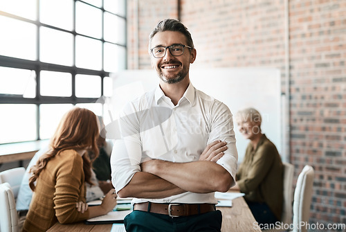 Image of Portrait, smile and man with startup, arms crossed and teamwork with confidence, workplace and happiness. Face, male CEO and leader in a workshop, meeting and collaboration for brainstorming