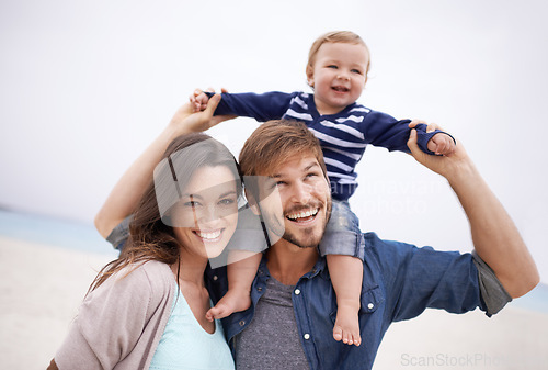 Image of Family, airplane and baby with parents at a beach for piggyback, fun and walking in nature. Love, kid and happy woman with man outdoors bonding, smile and relax while enjoying travel, freedom or game