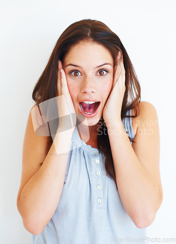 Image of Portrait, surprise and shocked woman in studio isolated on a white background. Wow, omg and face of female person with surprised expression, emoji and unexpected news, announcement or secret gossip.